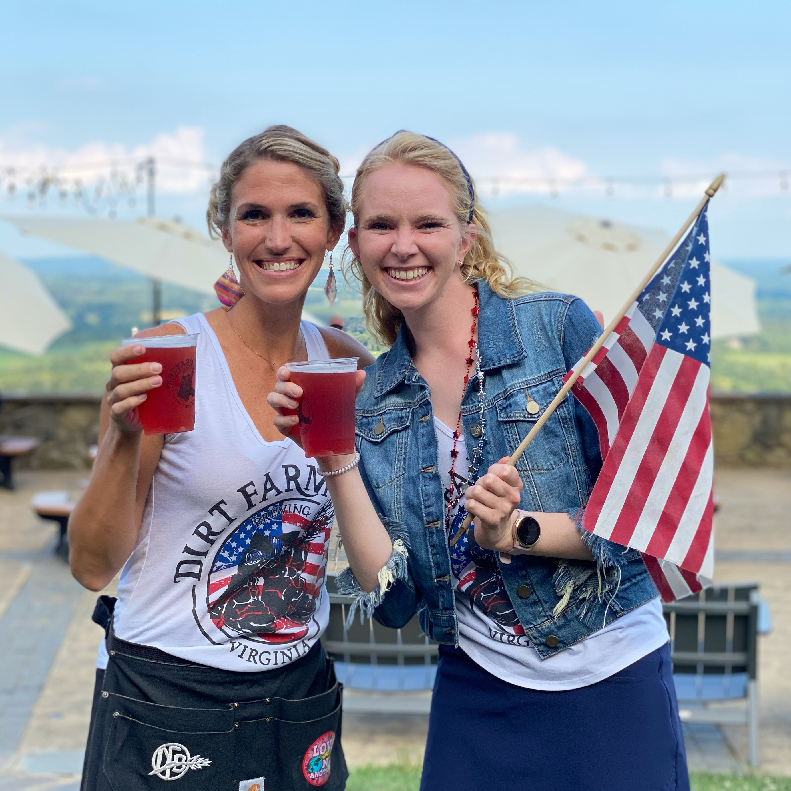 Dirt Farm Brewing Staff Posing With Beer and American Flags to celebrate The Fourth of July