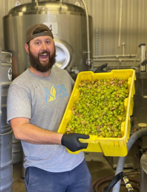 Loudoun County Brewery Dirt Farm Brewing Head Brewer with Hop Harvest