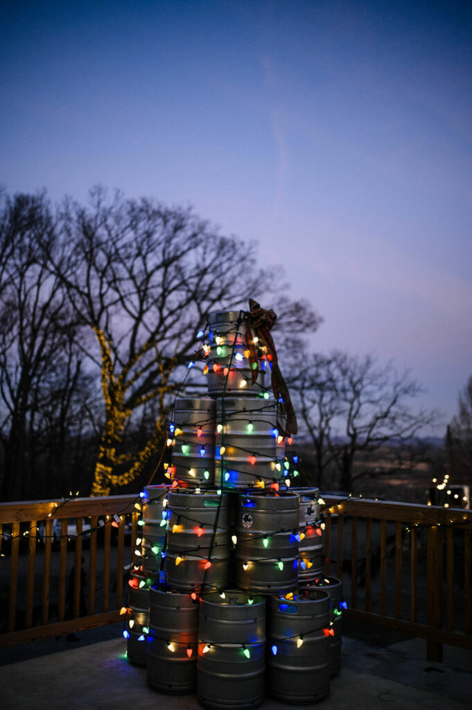 Christmas Tree made out of beer kegs dirt farm brewing loudoun county brewery to celebrate christmas eve
