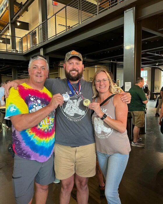 Virginia Craft Beer Cup Winners dirt farm brewing owners pose with medals