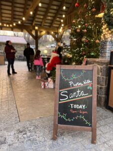Sign promoting photos with Santa at dirt farm brewing in Loudoun county