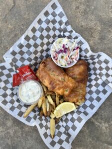 Fish fry Friday platter at Dirt Farm Brewing with fried fish, coleslaw, french fries and tarter sauce