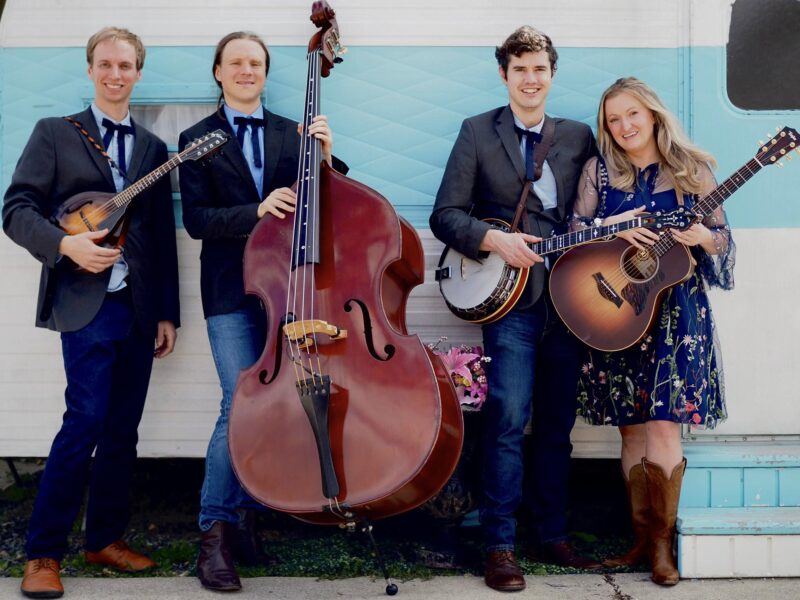 Live Music with Karma Creak image of the band posing with their instruments ready to play at dirt farm brewing