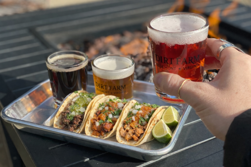 Beer and Tacos on a tray at dirt Farm brewings beer and taco pairing for Cinco de mayo in bluemont virginia