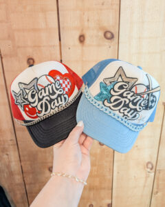 trucker hats that a guest decorated at the Tilly Goose Trucker Hat bar