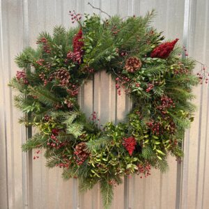 Holiday wreath designed at the wild on your door holiday wreath workshop at dirt farm Brewing in Loudoun county virginia