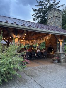 Guests enjoying supper outside at dirt farm brewing at one of their beer dinners in Loudoun county