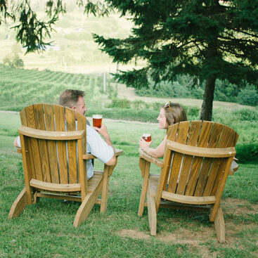 loudoun-county-engagement-photo-location-brewery Loudoun County Brewery Dirt Farm Brewing Couple Enjoying View of Loudoun Valley in Adirondack Chairs