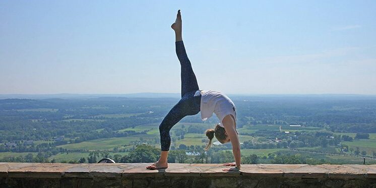 Yoga Pose on the patio at dirt farm brewing loudoun county brewery